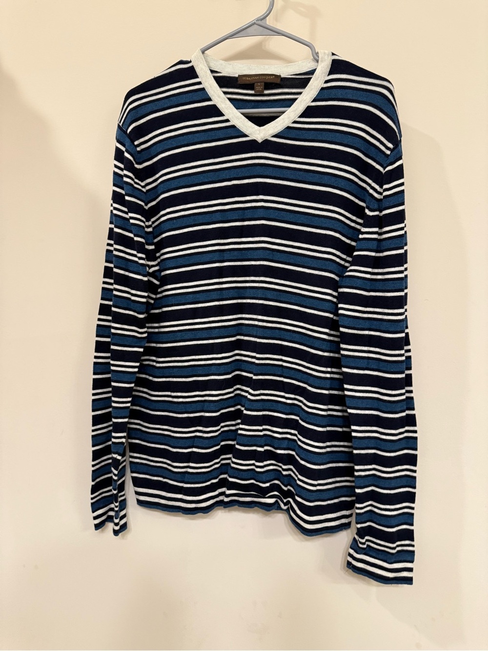Striped Navy V-Neck Sweater with Light Blue & White Accents